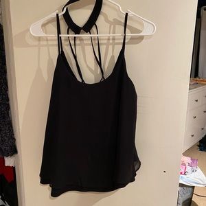Black flowy tank with back detailing
